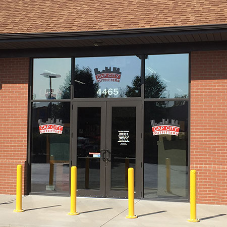 Cap City Outfitters entrance as seen from the parking lot